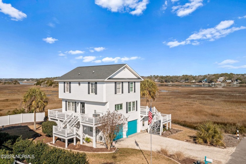 Prepare to be captivated by the breathtakingly beautiful and - Beach Home for sale in Holden Beach, North Carolina on Beachhouse.com