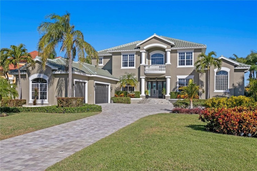 This home is truly Majestic!  A grand entryway with soaring - Beach Home for sale in Gulfport, Florida on Beachhouse.com