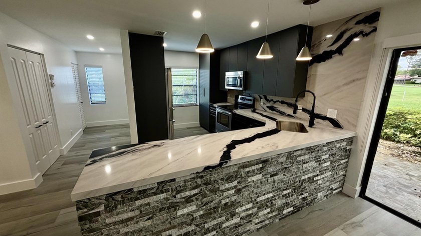 Exceptional & Rarely Available Ground-Floor Corner Residence - Beach Condo for sale in Boca Raton, Florida on Beachhouse.com