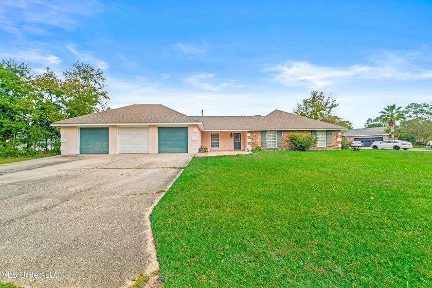 Experience the best of coastal and golf course living in this - Beach Home for sale in Pass Christian, Mississippi on Beachhouse.com