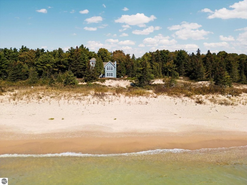 Perched at the center of Iron Ore Bay, your breath will be taken - Beach Home for sale in Beaver Island, Michigan on Beachhouse.com