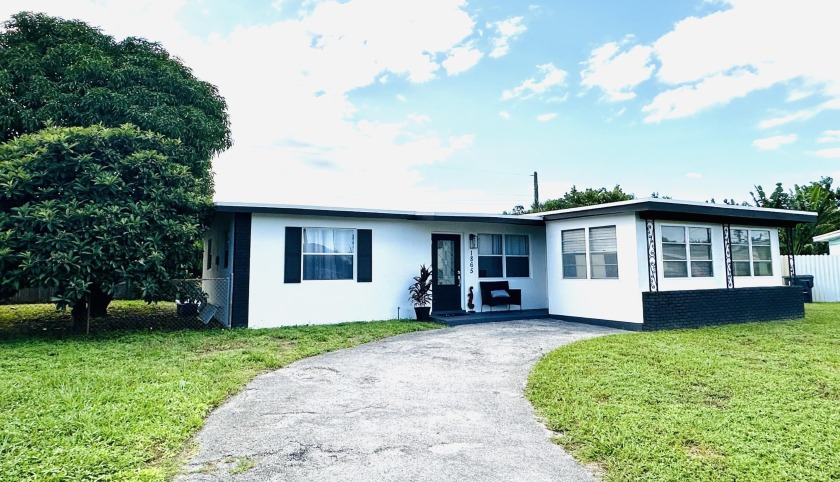 Completely remodeled open concept home in move in condition - Beach Home for sale in West Palm Beach, Florida on Beachhouse.com