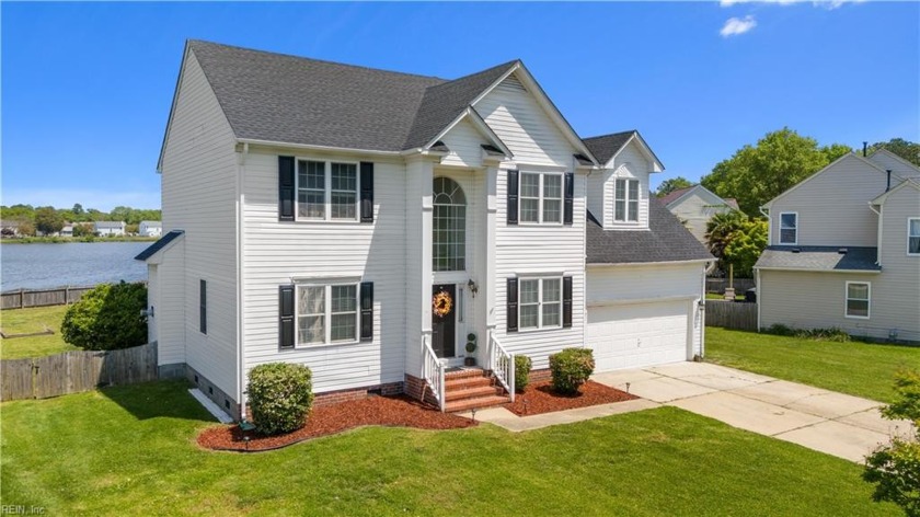 Discover serenity in this stunning 2,322 sqft lakefront home - Beach Home for sale in Suffolk, Virginia on Beachhouse.com