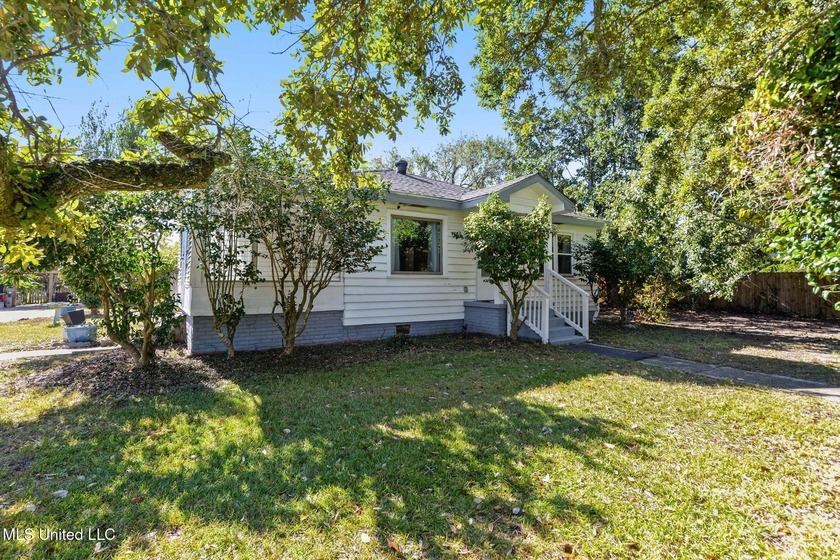 Renovated in 2022 and move-in ready-just a short walk to the - Beach Home for sale in Gulfport, Mississippi on Beachhouse.com