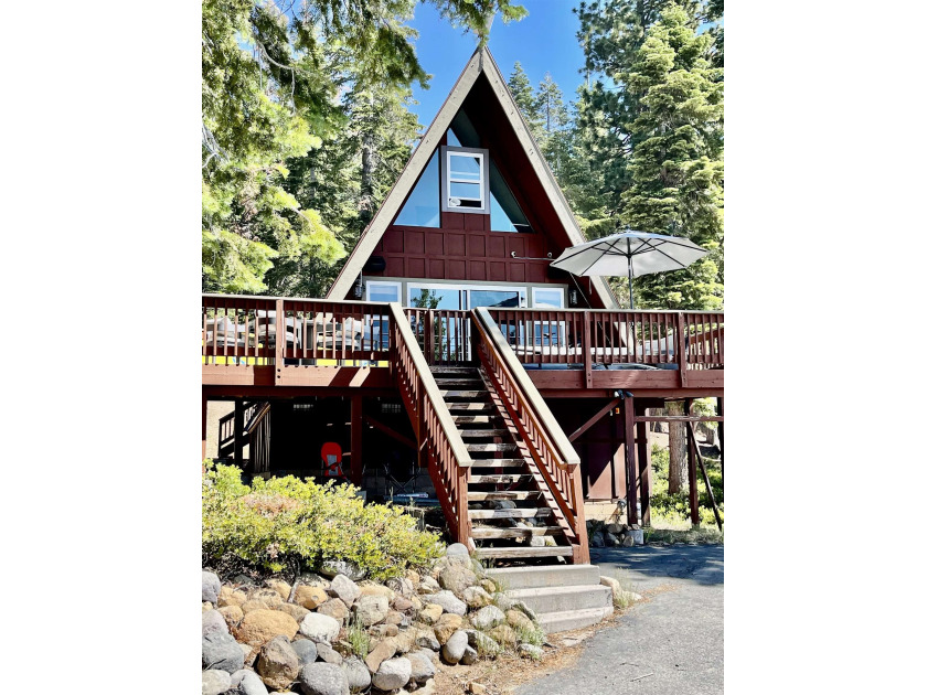 This idyllic A-frame cabin is perched on a bluff in the Tahoe - Beach Home for sale in Tahoe City, California on Beachhouse.com