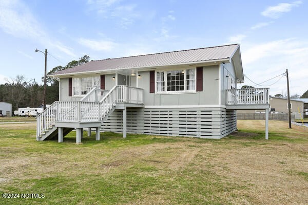 MOTIVATED SELLER**
Elevated on sturdy, covered stilts above the - Beach Home for sale in Aurora, North Carolina on Beachhouse.com