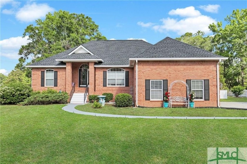 Beautiful all-brick 3BR/2BA home on .53 acres with serene pond - Beach Home for sale in Richmond Hill, Georgia on Beachhouse.com