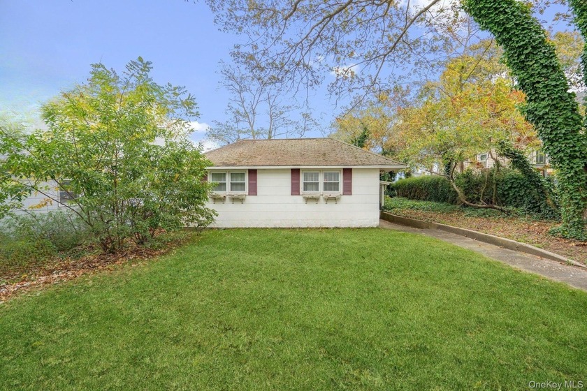 When you first pull up to this property, you may not know what - Beach Home for sale in Mastic, New York on Beachhouse.com