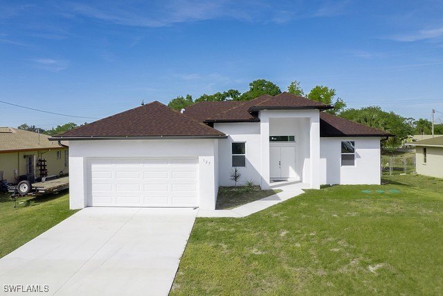 Step into this stunning new construction home featuring 3 - Beach Home for sale in Lehigh Acres, Florida on Beachhouse.com