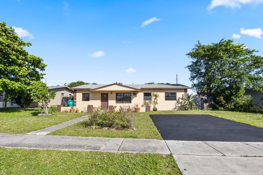 This charming 3-bedroom, 1-bathroom home offers a spacious front - Beach Home for sale in Boynton Beach, Florida on Beachhouse.com