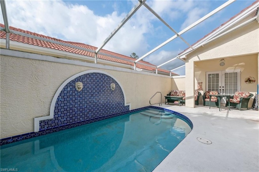 Just listed WATERFRONT home with courtyard pool. Sits on a - Beach Home for sale in Naples, Florida on Beachhouse.com