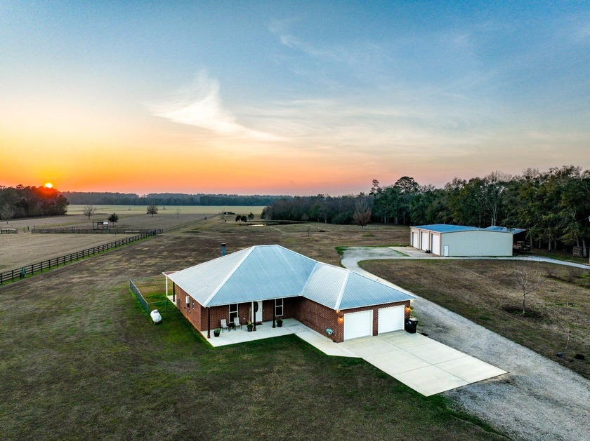 Down a private entrance secluded from a quiet stretch of paved - Beach Home for sale in Elberta, Alabama on Beachhouse.com