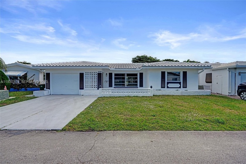 Welcome home to this beautifully updated waterfront residence - Beach Home for sale in Tamarac, Florida on Beachhouse.com