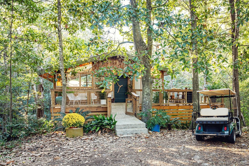 Discover a true architectural treasure tucked beneath the oaks - Beach Home for sale in Ocean Springs, Mississippi on Beachhouse.com
