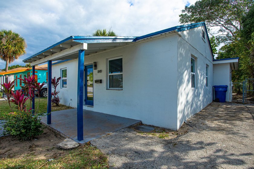 Home is move-in ready! This spacious 4-bedroom, 2-bath - Beach Home for sale in Riviera Beach, Florida on Beachhouse.com