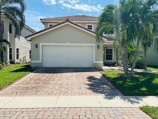 This beautiful 3-bedroom, 2.5-bath, two-story home in the heart - Beach Home for sale in Greenacres, Florida on Beachhouse.com