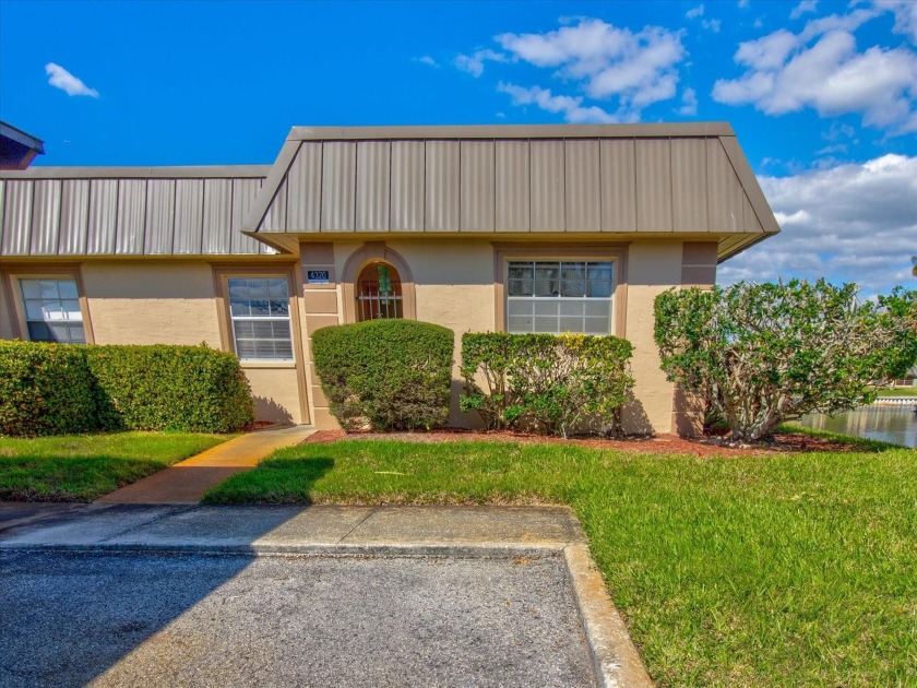 Experience the epitome of  55+ community living at the Gardens - Beach Condo for sale in New Port Richey, Florida on Beachhouse.com