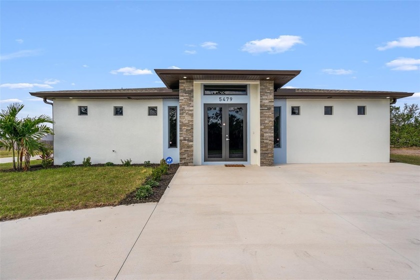 UNIQUE, Newly Built 4 Bedroom, 4 1/2 Bath home. All 4 Bedrooms - Beach Home for sale in North Port, Florida on Beachhouse.com