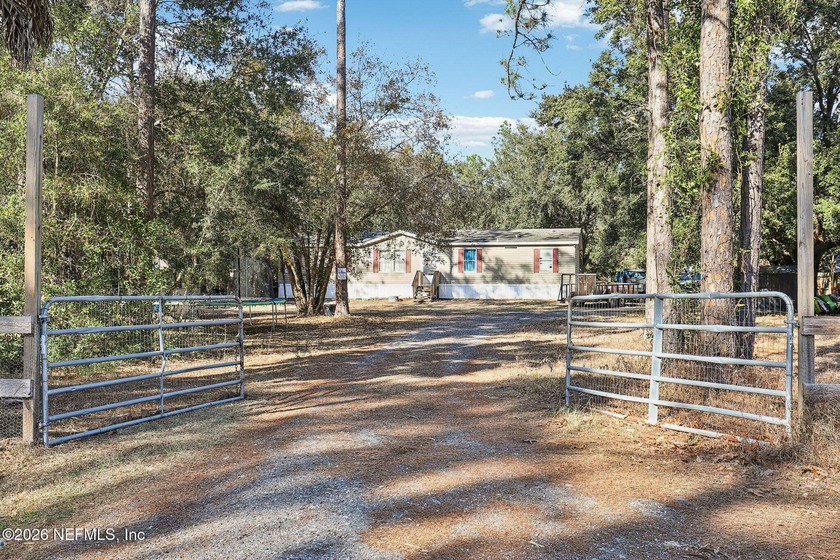 This 3-bedroom, 2-bath manufactured home, built in 2020, sits on - Beach Home for sale in Fernandina Beach, Florida on Beachhouse.com