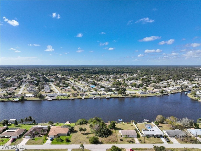 GORGEOUS VIEW OF THE BIG WIDE CANAL AND CONCRETE SEAWALL, ONE - Beach Lot for sale in Port Charlotte, Florida on Beachhouse.com