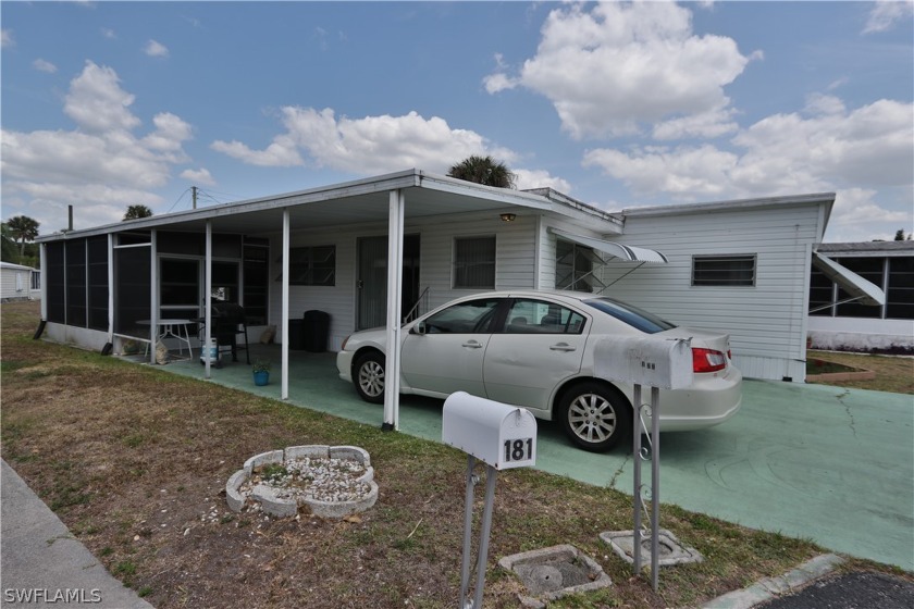 Cute and cozy mobile home with a water view & canal in the back - Beach Home for sale in North Fort Myers, Florida on Beachhouse.com