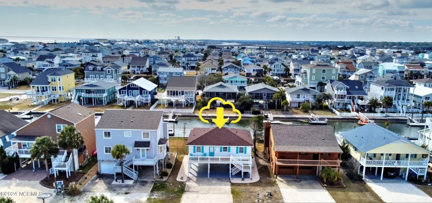 Treat yourself to this gorgeous canal home that would serve well - Beach Home for sale in Ocean Isle Beach, North Carolina on Beachhouse.com
