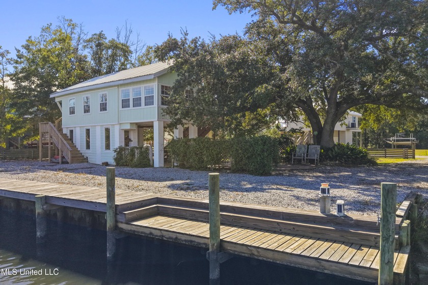 Welcome to your coastal getaway - a beautifully renovated raised - Beach Home for sale in Bay Saint Louis, Mississippi on Beachhouse.com
