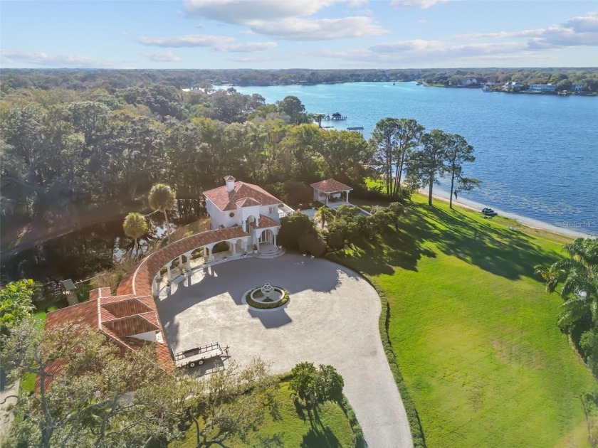Escape to your 1.8 acre private paradise on Lake Carroll with - Beach Home for sale in Tampa, Florida on Beachhouse.com