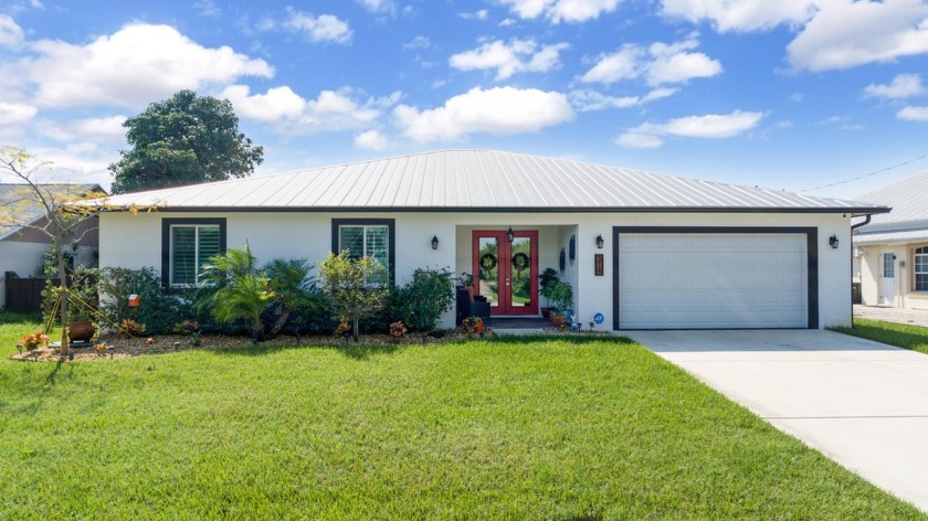 WELCOME HOME to this turnkey waterfront property complete with - Beach Home for sale in Port Saint Lucie, Florida on Beachhouse.com