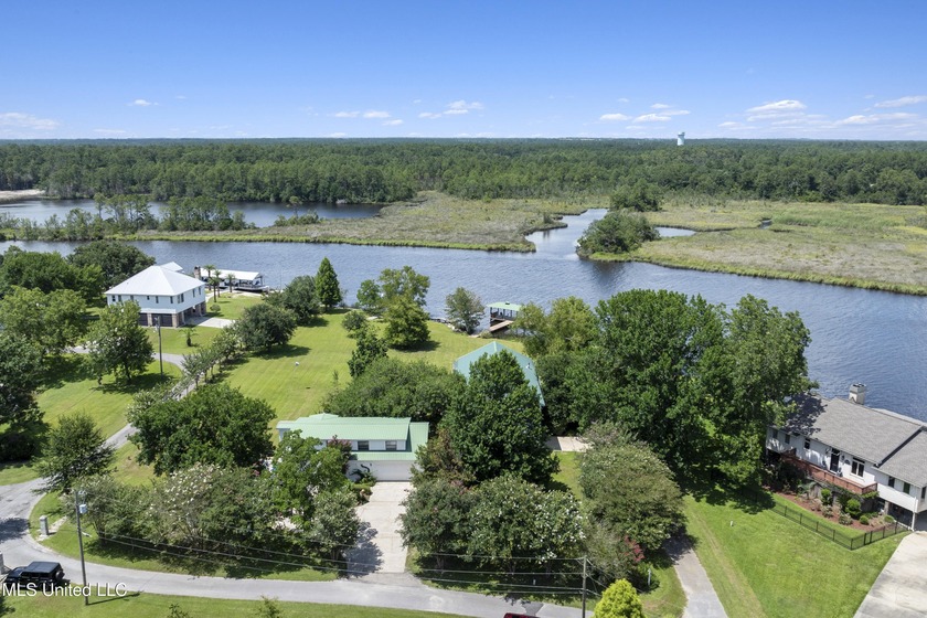 LOCATION LOCATION LOCATION! Discover this dream waterfront - Beach Home for sale in Biloxi, Mississippi on Beachhouse.com