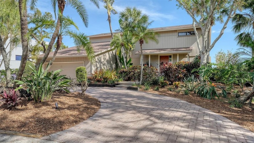 Set on 110+ feet of waterfront with an impressive 11' elevation - Beach Home for sale in Sarasota, Florida on Beachhouse.com