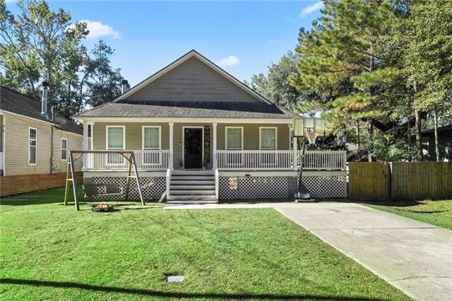 CHARMING ACADIAN STYLE HOME ON A QUIET STREET! Step into - Beach Home for sale in Slidell, Louisiana on Beachhouse.com