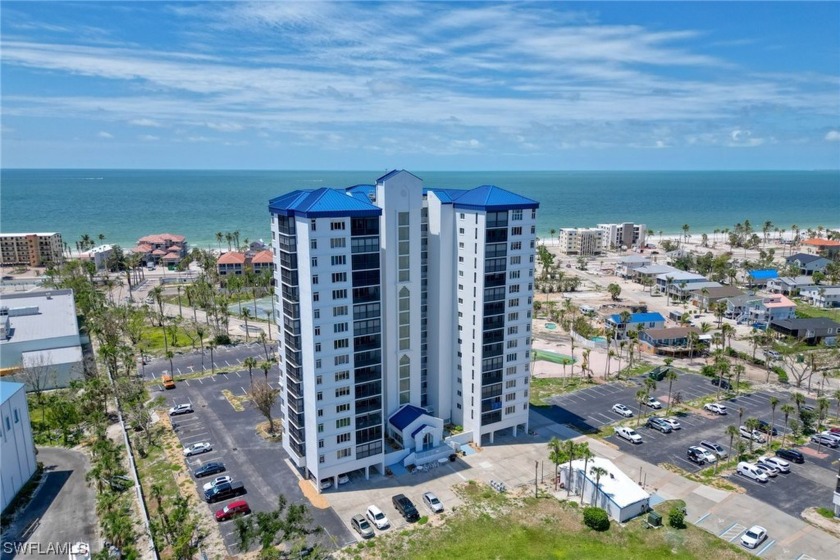 Watch the dolphins play in the Back Bay from your 8th floor - Beach Condo for sale in Fort Myers Beach, Florida on Beachhouse.com