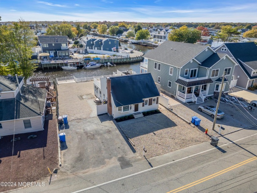 Discover waterfront living at its finest in this renovated - Beach Home for sale in Manahawkin, New Jersey on Beachhouse.com