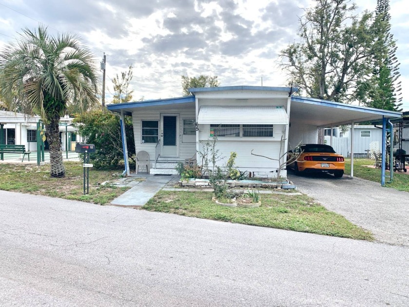 This CUTE 2 Bedroom, 1 Bathroom PARTIALLY FURNISHED Home is in - Beach Home for sale in Clearwater, Florida on Beachhouse.com