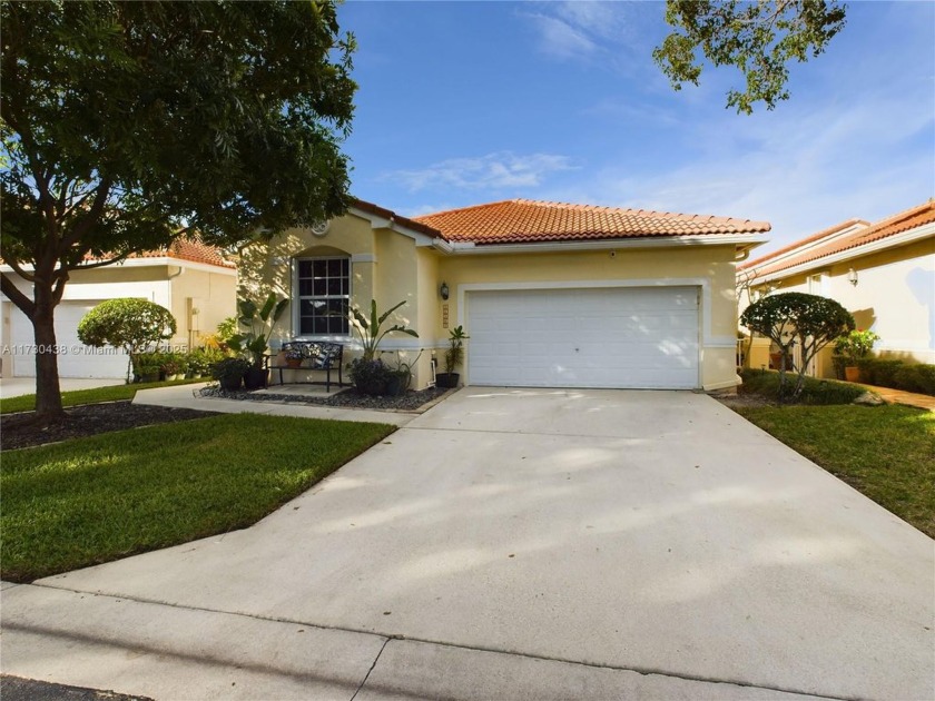 Accepting BACKUP OFFER. Discover tranquil lakefront living in - Beach Home for sale in Coral Springs, Florida on Beachhouse.com