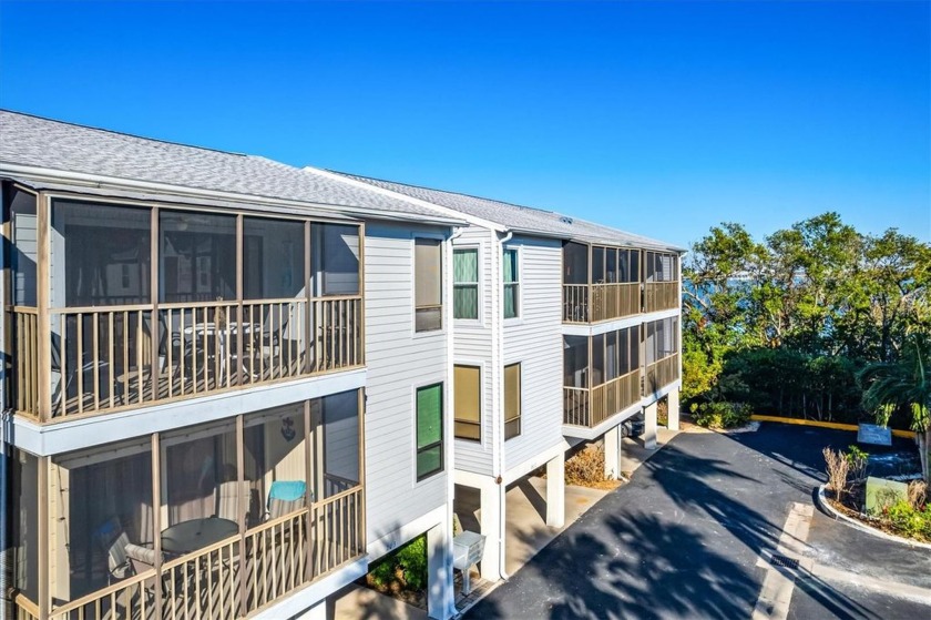 Welcome to this light, bright, beautiful, and fully furnished - Beach Condo for sale in Holmes Beach, Florida on Beachhouse.com