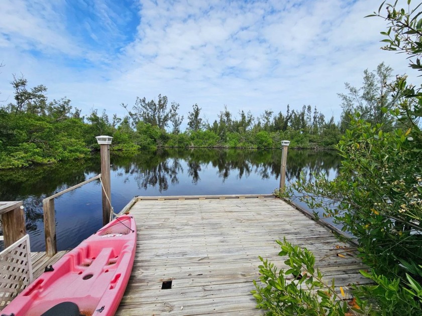 This home is situated directly on the water! Amazing location - Beach Home for sale in Bokeelia, Florida on Beachhouse.com