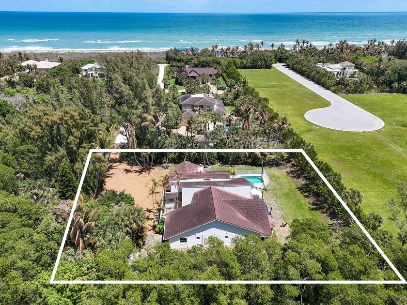 Privately positioned at the end of a secluded road on highly - Beach Home for sale in Jupiter Island, Florida on Beachhouse.com