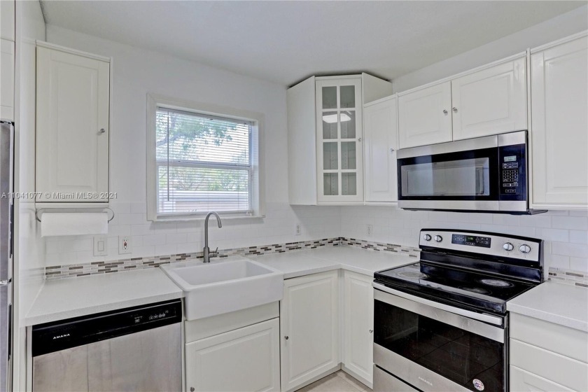 Spacious ground-floor corner condo featuring 3 bedrooms and 2 - Beach Condo for sale in West Palm Beach, Florida on Beachhouse.com