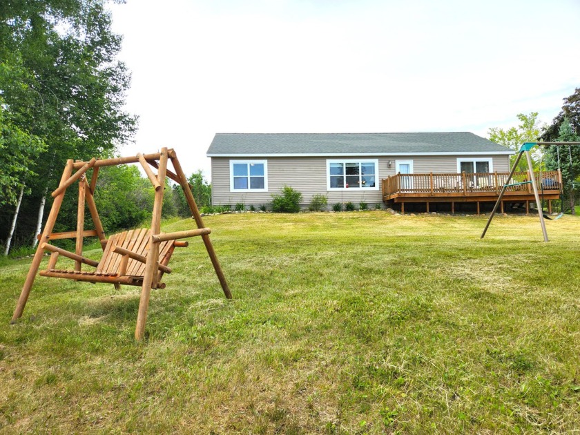 Discover unparalleled beauty and tranquility at this remarkable - Beach Home for sale in Cheboygan, Michigan on Beachhouse.com