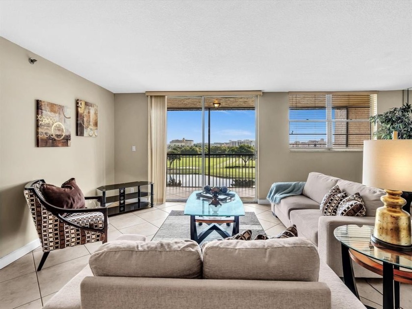 Experience elevated living in this beautifully updated 2-bed - Beach Condo for sale in Davie, Florida on Beachhouse.com