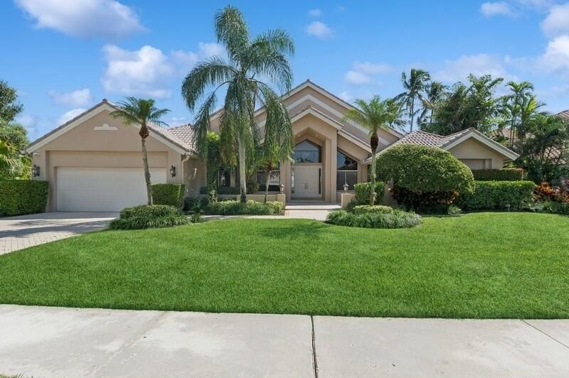 Rarely available spacious one-story home in the Estates section - Beach Home for sale in Boca Raton, Florida on Beachhouse.com