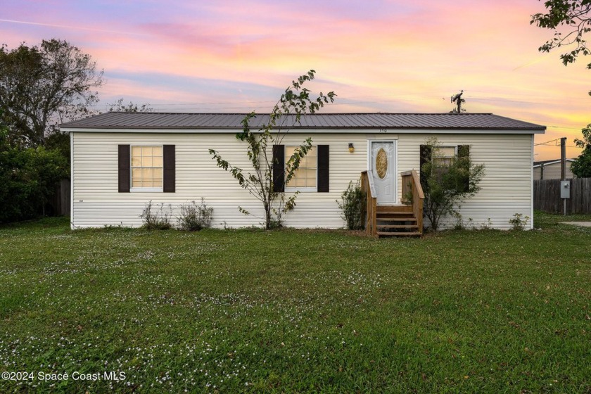 WELL MAINTAINED 3-bed/2-bath home with NEW METAL ROOF in the - Beach Home for sale in Merritt Island, Florida on Beachhouse.com