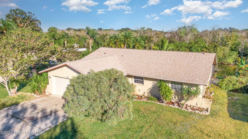 WATERFRONT POOL HOME ON TURKEY CREEK - Your tropical paradise - Beach Home for sale in Palm Bay, Florida on Beachhouse.com