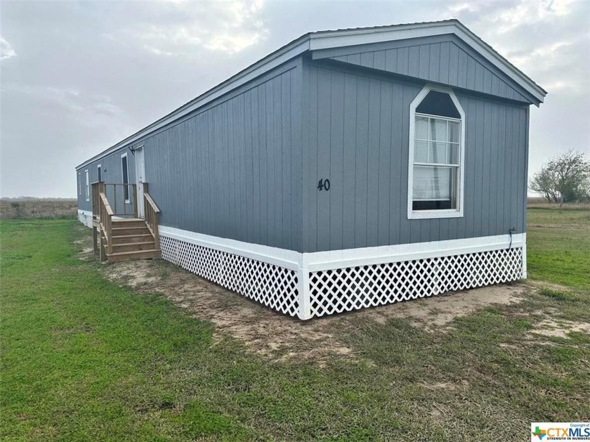 This spacious 3-bedroom 2 bath manufactured home is located in a - Beach Home for sale in Palacios, Texas on Beachhouse.com