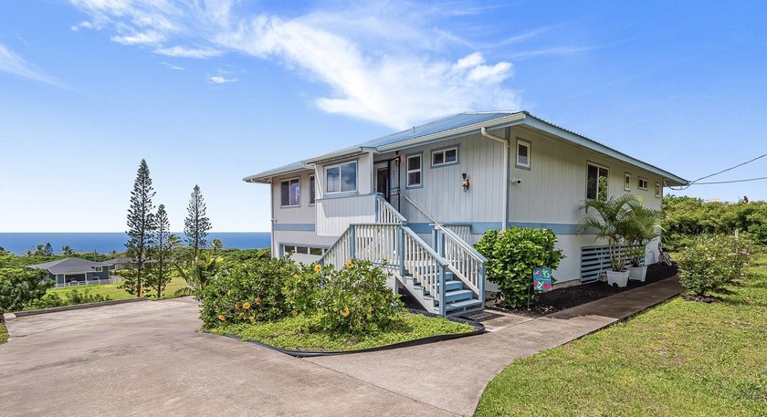 Perched along the 4th fairway of Discovery Harbour Golf Course - Beach Home for sale in Naalehu, Hawaii on Beachhouse.com