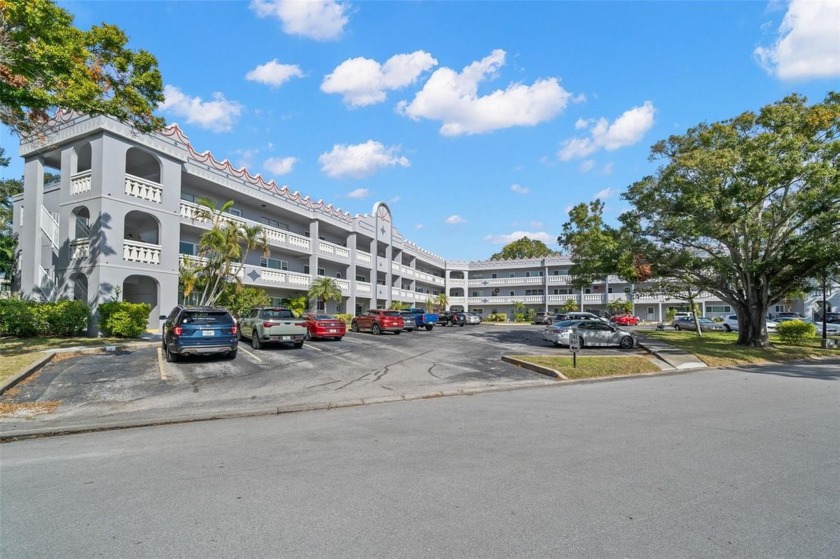 Don't miss this home in the highly sought-after 55+ active gated - Beach Condo for sale in Clearwater, Florida on Beachhouse.com