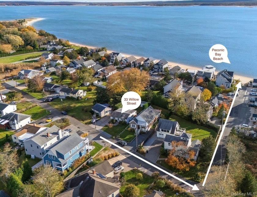 This exquisite turn-key coastal retreat offers the perfect blend - Beach Home for sale in Aquebogue, New York on Beachhouse.com