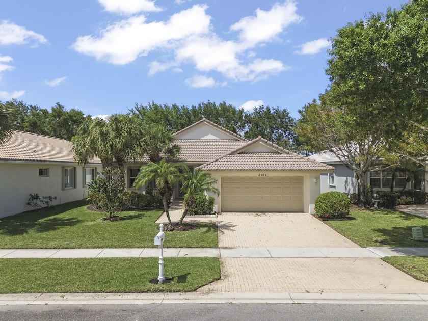 Welcome to a beautifully maintained residence nestled within the - Beach Home for sale in West Palm Beach, Florida on Beachhouse.com